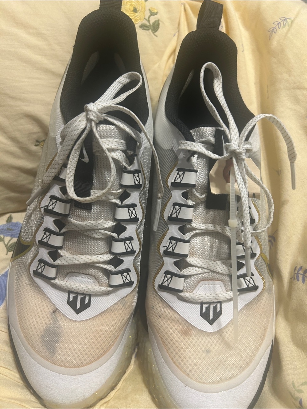 Nike White and Black Men's Sneakers with Gold Accent